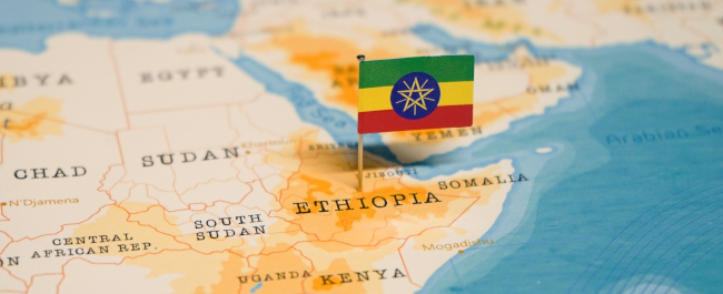 a close up map of the east coast of Africa with an Ethiopian flag pin identifying Ethiopia